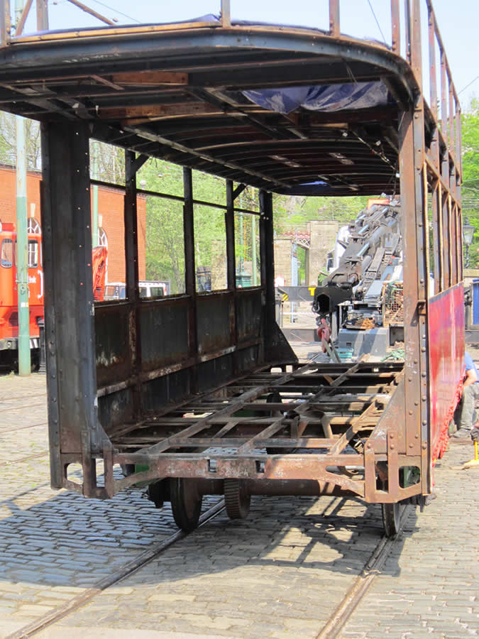 A view showing how much of the tramcar has been removed in the process of stripping it down to its framework