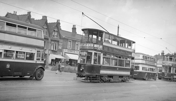 A view of motor buses and tramcars operating together in 1947