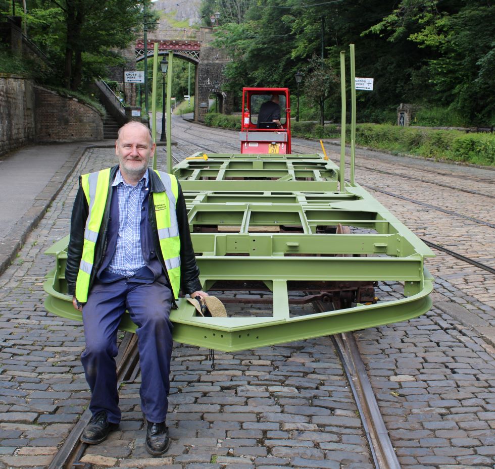 Peter Whiteley sitting on under frame 